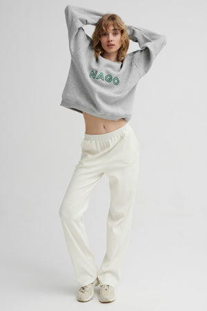 Spodnie z bawełny organicznej / 04 / 14 / cream white*bluza-z-bawelny-organicznej-17-19-mist-grey* ?Modelka ma 179cm wzrostu i prezentuje rozmiar XS?