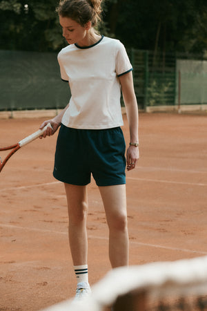 T-shirt z bawełny / 13 / 30 / cream white *szorty-z-bawelny-09-15-silent-blue,skarpety-z-bawelny-21-21-cream-white-1* ?Modelka ma 180 cm wzrostu i prezentuje rozmiar XS?