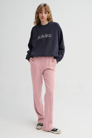 Spodnie z bawełny organicznej / 04 / 14 / peony pink *bluza-z-bawelny-organicznej-17-19-volcanic-sand* ?Modelka ma 179 cm wzrostu i prezentuje rozmiar XS?